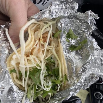 Surf Taco - Long Branch - Hard to see. But it's a Mahi fish Taco. A wee skimpy on the taco but was tasty. - Mexican Near Me - Long Branch, New Jersey Surf Taco - Long Branch - Hard to see. But it's a Mahi fish Taco. A wee skimpy on the taco but was tasty. - Mexican Near Me - Long Branch, New Jersey