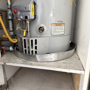 Overtime Plumbing - Installed a drip pan and spout for emergency overflow - Plumbing Near Me Overtime Plumbing - Installed a drip pan and spout for emergency overflow - Plumbing Near Me