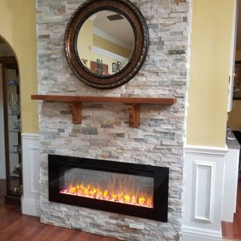 RTL phillips - Custom led fireplace w/stone, cedar mantle. - General Contractors Near Me RTL phillips - Custom led fireplace w/stone, cedar mantle. - General Contractors Near Me
