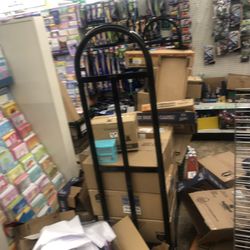 Dollar Tree - Can't even walk down the aisles.