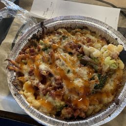 Gouda Mac with bacon, broccoli, and hot honey drizzle.