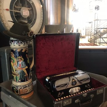 Lagerhaus - a beer can and a case on a table - Beer Bar Near Me - Detroit, Michigan