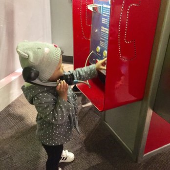 Children's Museum - Playing telephone - Children's Museums Near Me - Houston, Texas