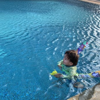 Pacifica Honolulu - My son enjoying the pool. - Real Estate Services Near Me - Honolulu, Hawaii Pacifica Honolulu - My son enjoying the pool. - Real Estate Services Near Me - Honolulu, Hawaii