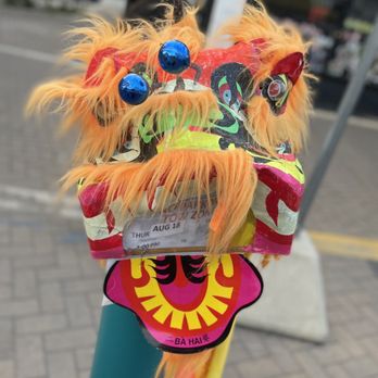 Argyle Night Market - a colorful lion head on a pole - Farmers Market Near Me - Chicago, Illinois Argyle Night Market - a colorful lion head on a pole - Farmers Market Near Me - Chicago, Illinois