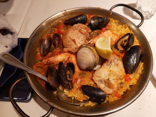 Photo of Club Espagnol de Québec - Montréal, QC, CA. a bowl of seafood and rice