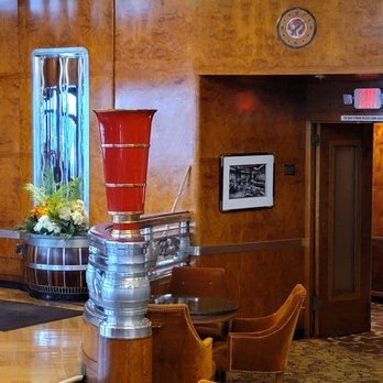 The Observation Bar - a red vase on a pedestal - Bars Near Me - Long Beach, California