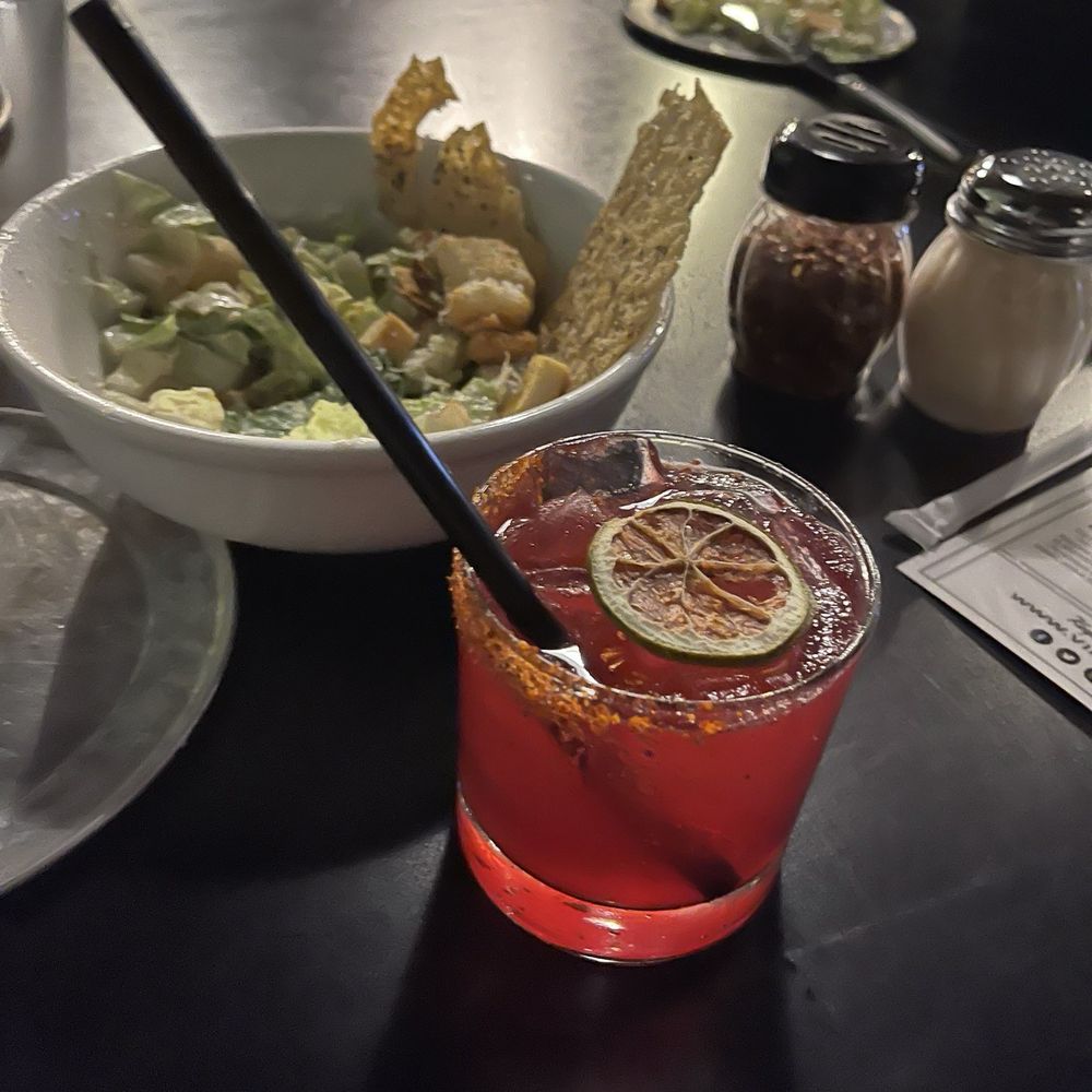 Via 313 Pizza - The hibiscus Margarita and some of the Caesar salad with the yummy Parmesan crisp! - Pizza Near Me - Austin, Texas Via 313 Pizza - The hibiscus Margarita and some of the Caesar salad with the yummy Parmesan crisp! - Pizza Near Me - Austin, Texas