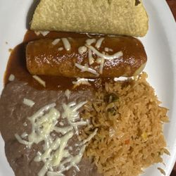 Taco, enchilada, rice and beans