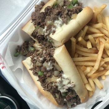 Ishkabibble's - Cheesesteak with American cheese peppers and onions; fries. - American Near Me - Philadelphia, Pennsylvania Ishkabibble's - Cheesesteak with American cheese peppers and onions; fries. - American Near Me - Philadelphia, Pennsylvania