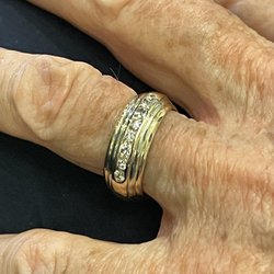 Jensen Jewelers - Finished product delighted my mother with my Dad's wedding band "hugging " both sides of her band