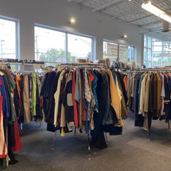 Our Finds Your Treasures - Racks of clothes. Aug, 2025.