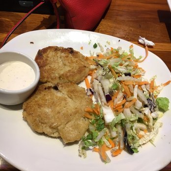 Outback Steakhouse - Sad crab cakes and brown wilted undressed salad - Steakhouses Near Me - Bayside, New York