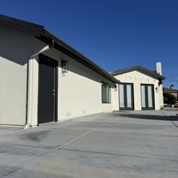 NuHome Fogcoat & Painting - The finished product of a complete exterior fogcoat & painting on a Santa Barbara smooth finish stucco located in Temecula, California.