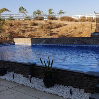 Secard Pools & Spas - Here's the front view with the 4 beautiful waterfalls and the newly planted landscape - Hot Tub & Pool Near Me - Menifee, California Secard Pools & Spas - Here's the front view with the 4 beautiful waterfalls and the newly planted landscape - Hot Tub & Pool Near Me - Menifee, California