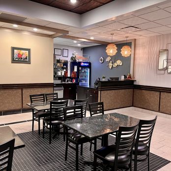 Thai Basil - a restaurant with tables and chairs - Chinese Near Me - Regina, Saskatchewan Thai Basil - a restaurant with tables and chairs - Chinese Near Me - Regina, Saskatchewan