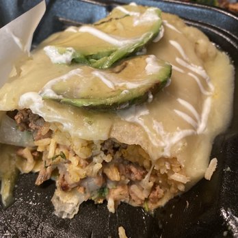 Takos - Wet burrito. Asada/chicken. Cut in half it was so huge! Very filling and delicious! - Tacos Near Me - Bellflower, California Takos - Wet burrito. Asada/chicken. Cut in half it was so huge! Very filling and delicious! - Tacos Near Me - Bellflower, California
