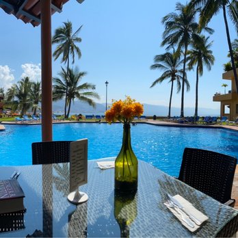 Café Chapultepec - Table by the pool - Barbeque Near Me - Puerto Vallarta, JAL