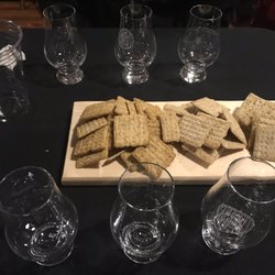 Alchemist Society - Snacks and glasses lined up to taste Penderyn Whiskey