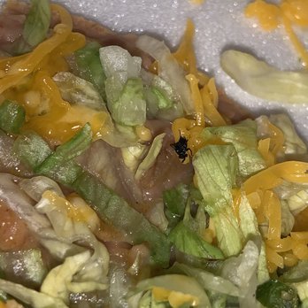 FasTaco - a close up of a salad with lettuce and cheese - Mexican Near Me - Burleson, Texas FasTaco - a close up of a salad with lettuce and cheese - Mexican Near Me - Burleson, Texas