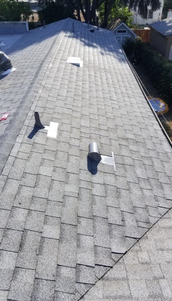 Slide of Rex Roofing