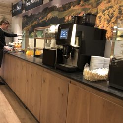 Hotel URDLWIRT - Coffee / juice section of breakfast buffet in early March 2018.