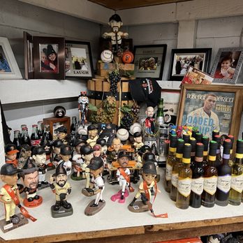 Better Foods Deli - a shelf full of wine bottles and figurines - Delis Near Me - Roseville, California Better Foods Deli - a shelf full of wine bottles and figurines - Delis Near Me - Roseville, California