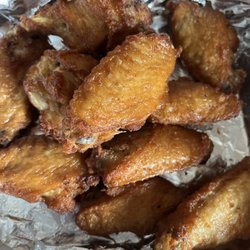 Terry’s Bar and Grill - Bone in Wings, sauce on the side.  So juicy with a nice crisp skin.  Excellent wings!