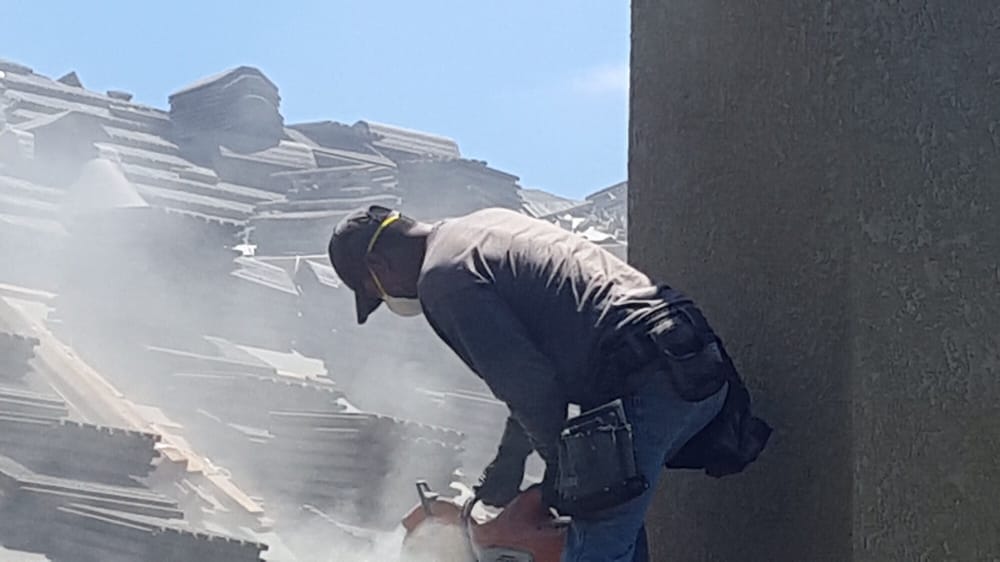 Slide of Carlos Galan Roofing