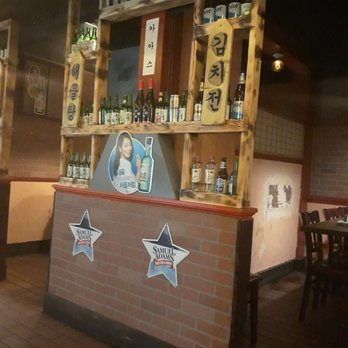 Mr Kimchi - Golf Road - They decorate the booth with a wall of soju - Korean Near Me - Mount Prospect, Illinois Mr Kimchi - Golf Road - They decorate the booth with a wall of soju - Korean Near Me - Mount Prospect, Illinois