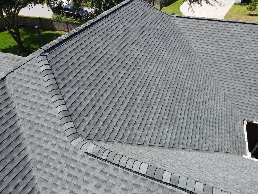 Slide of Core Four Roofing