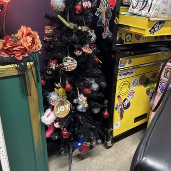 Space Monkey Tattoo - She has Christmas year round - Tattoo Near Me - Arlington, Texas