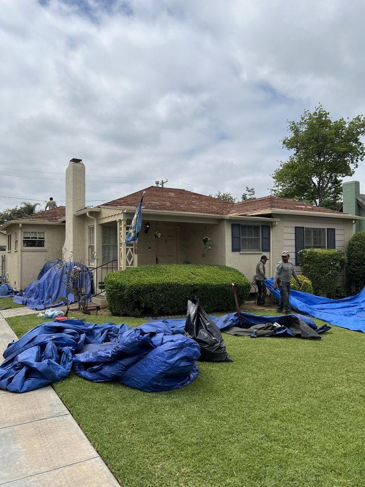 Slide of Manna Roofing Company