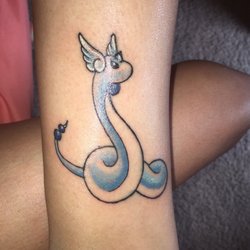Buu and Tee Tattoo - Tail doesn't connect. Lining sucks. Horns damaged. Ears should of been white.