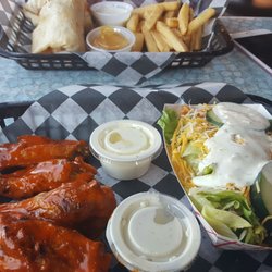 The Wing Company - Crispy chicken wrap with fries and Hot wings with a side salad
