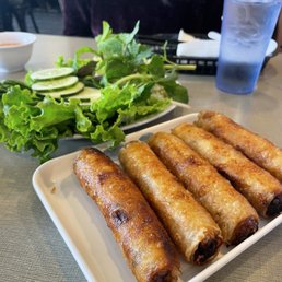 Egg rolls with complimentary greens and fish sauce Egg rolls with complimentary greens and fish sauce