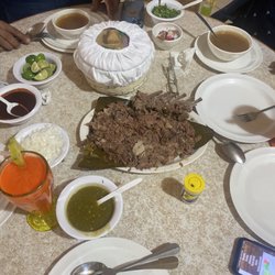 Barbacoa Santiago - Neck and backbone meat with fresh orange/carrot juice. .