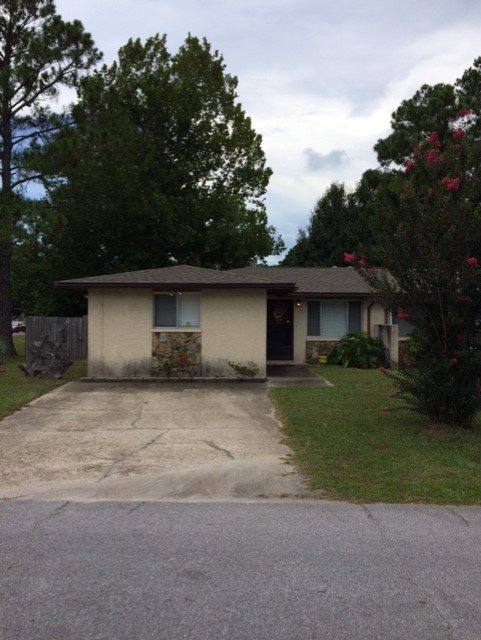Slide of Greg's Roofing Of Bay County