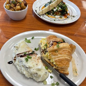 Bonjour Cafe - The French Style Scramble Eggs Plus Tomatoes Mushroom And Parmesan  Croissant bacon, egg, and cheese with a side of mashed potatoes - Cafes Near Me - Katy, Texas