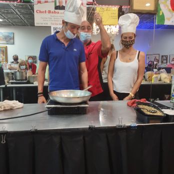 Chef Baba Cooking Class - The chef is explaining how to cook the bruschetta - Cooking Classes Near Me - Davie, Florida