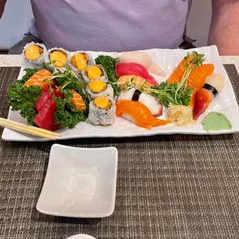 Kinja Sushi - a plate of sushi and chopsticks - Sushi Bars Near Me - Barrie, Ontario Kinja Sushi - a plate of sushi and chopsticks - Sushi Bars Near Me - Barrie, Ontario