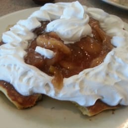 Single pancake with Apple topping and whipped cream Single pancake with Apple topping and whipped cream