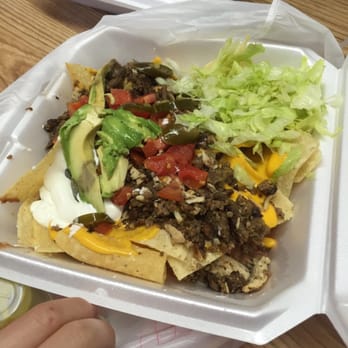 Taqueria El Crucero - The nachos do have liquid cheese but it's forgivable because they're tasty - Mexican Near Me - Waco, Texas Taqueria El Crucero - The nachos do have liquid cheese but it's forgivable because they're tasty - Mexican Near Me - Waco, Texas