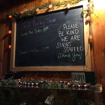 The Olde Log Inn - a chalkboard with a message on it - American Near Me - Lake George, New York The Olde Log Inn - a chalkboard with a message on it - American Near Me - Lake George, New York