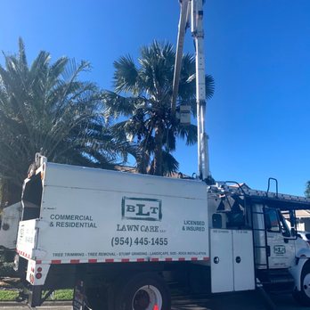 BLT Lawncare - a man working on a utility truck - Landscaping Near Me - Hollywood, Florida BLT Lawncare - a man working on a utility truck - Landscaping Near Me - Hollywood, Florida