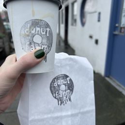 To go coffee and a bag of donuts