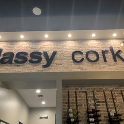 Classy Cork - Lovely interiors with a large wine selection on the interior wall.