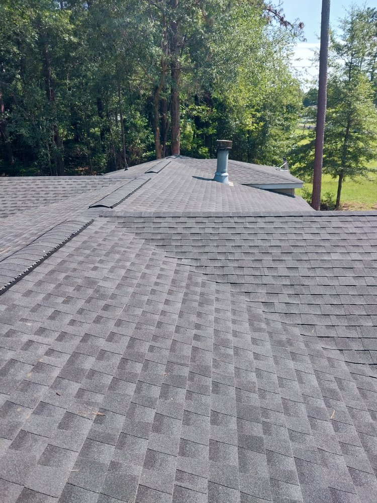 Slide of Tyndal Roofing