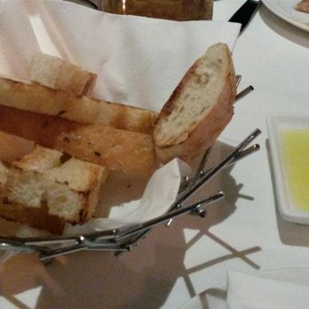 Dolce Italian - House bread. Oven toasted and sprinkled with rosemary and olive oil. - Italian Near Me - Miami Beach, Florida