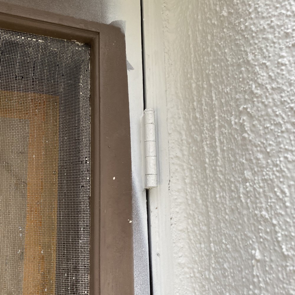 Priority Painting - Painted over hinges and wood french doors without protecting them (were then going to paint wood trim over that until I stopped them). - Painters Near Me - Los Angeles, California Priority Painting - Painted over hinges and wood french doors without protecting them (were then going to paint wood trim over that until I stopped them). - Painters Near Me - Los Angeles, California